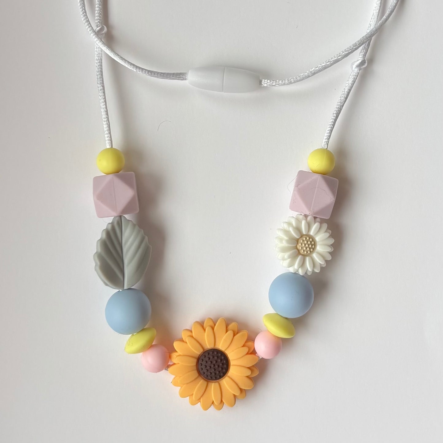 Collar de lactancia de silicona alimentaria una pieza diseño Girasol – Rasdelma