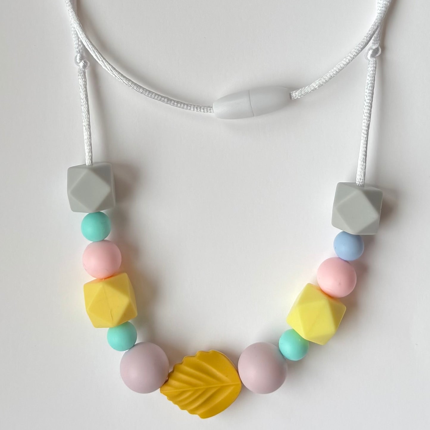 Collar de lactancia de silicona alimentaria diseño Sol – Rasdelma